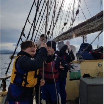 School children hauling kines 